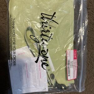 Thirty-One Light Green Rubie Mini with wrist strap